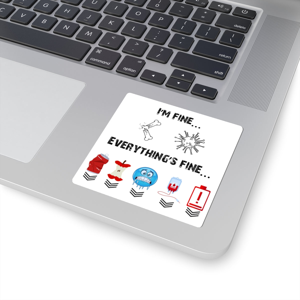 Laptop with a sticker reading 'I'm fine... Everything's fine...' on the palm rest area.