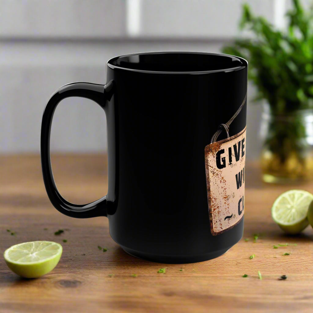 Black mug with a rustic label design on a white background