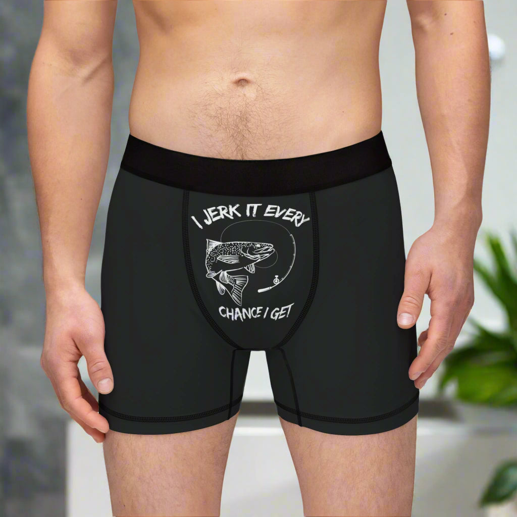 Black boxer briefs with a graphic design and text on a white background