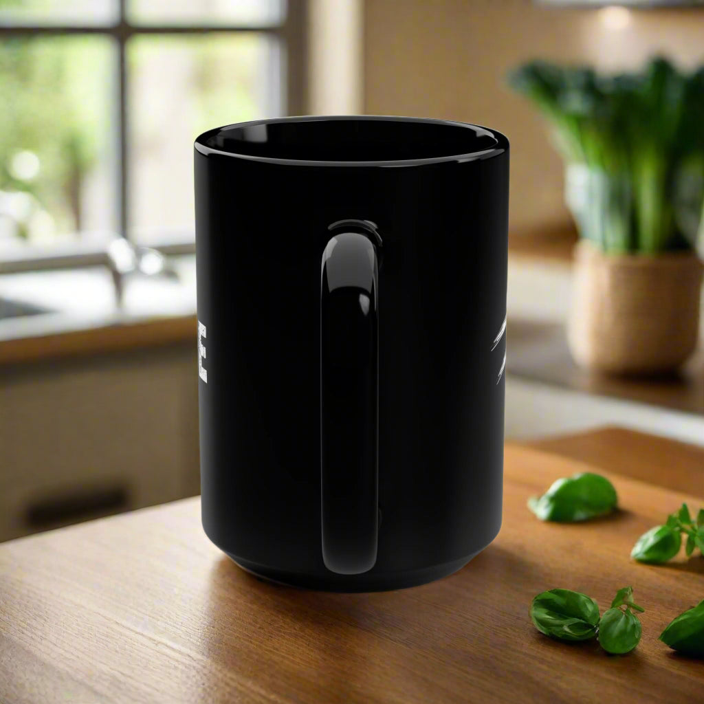 Black mug with a handle on a white background