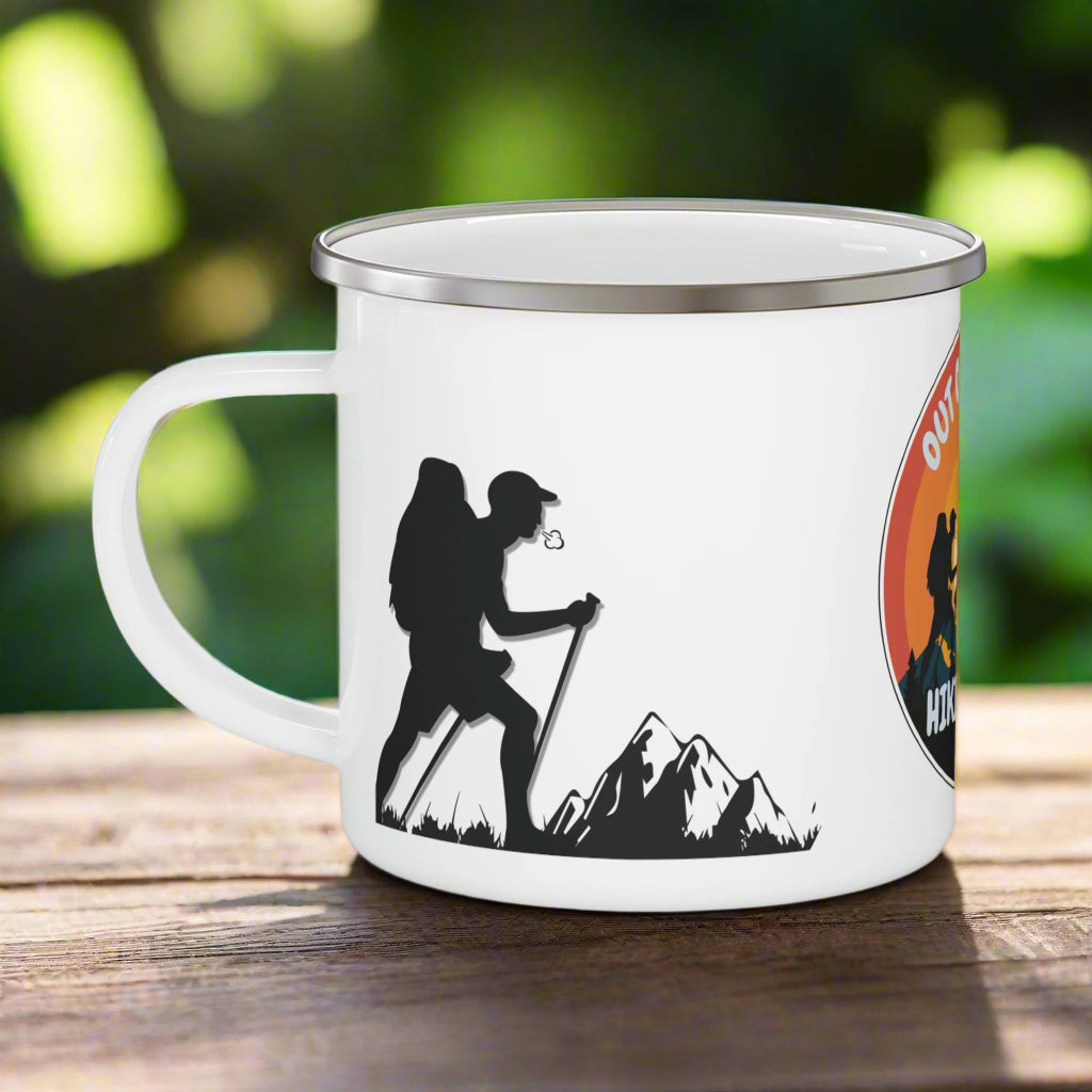 White enamel mug with hiking design and logo on a white background
