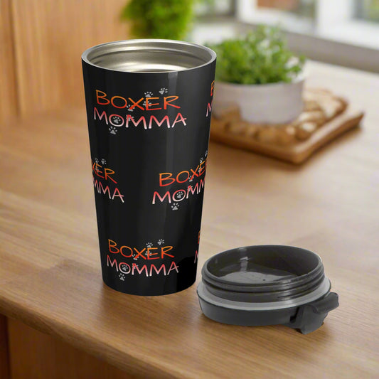 Black travel mug with 'Boxer Momma' text and paw prints on a white background