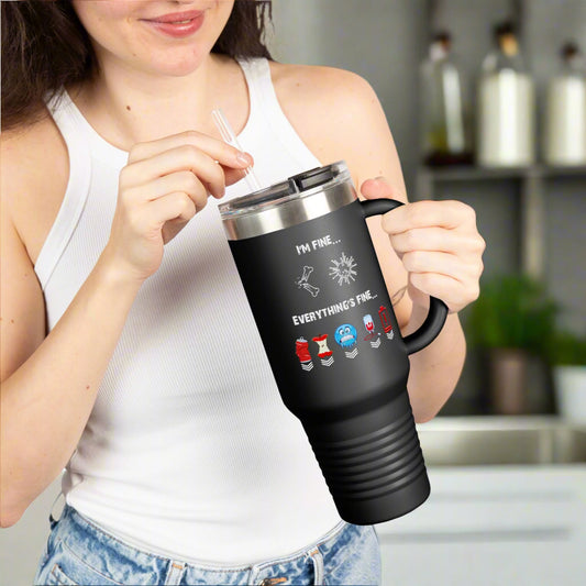 Person holding a black travel mug with text and icons on a white background