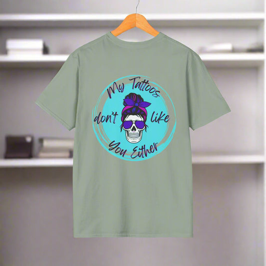 Green t-shirt with a skull and text design on a white background
